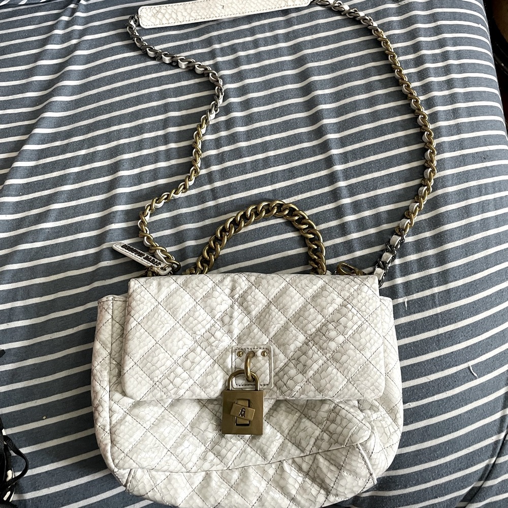 Snake Skin Steve Madden bag.